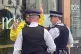 An anti monarchy protester being arrested in central London
