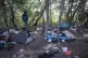 STUCK IN SQUALOR: A refugee encampment in a wood in Calais 