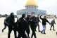 Israeli police confront Palestinians in front of the Dome of