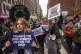 CLASS ISSUES: People chant while marching during a ‘march 