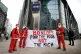 A TIME FOR SHARING: Anti-poverty Santas protest bankers bonu