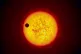 An artist’s impression of transiting exoplanet Corot-9b wh