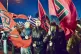 Golden Dawn members with flags with the ‘meander’ symbol