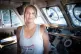 Lea Reisner on the deck of the Louise Michel