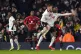 Fulham's Tosin Adarabioyo celebrates scoring the equaliser o