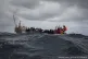 Members of the Ocean Viking rescue ship pick up refugees fro