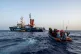 An SOS humanity vessel carrying refugees approaches their bo