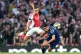 Arsenal's Leandro Trossard (left) and Paris Saint Germain's Achraf Hakimi battle for the ball during the UEFA Champions League semi final, first leg match at the Emirates Stadium, London. Picture date: Tuesday April 29, 2025