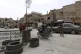 A Syrian government security forces gunman stand guards on a checkpoint at one of Jaramana suburb entrances, April 30, 2025