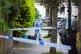 A forensics officer is seen in Kentish Town, north London, May 12, 2025