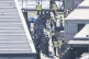 A group of people believed to be migrants are lead through the Border Force compound in Dover, Kent, following small boat crossings in the Channel, May 12, 2025