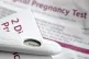 A pregnancy test kit indicating pregnancy