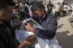 Mohannad Al-Agha holds the body of his niece, Zeina Al- Agha (2) who was killed in by an Israeli air strike, during, her funeral at Nasser Hospital in Khan Younis, Gaza Strip, May 11, 2025