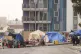 Tents are set up along a freeway in a homeless encampment, May 12, 2025, in Los Angeles
