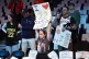 Fans hold up signs for Indiana Fever's Caitlin Clark before the start of a WNBA basketball game against the New York Liberty, May 18, 2024, in New York