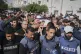 Colleagues carry the body of Palestinian journalist Hassan Essliah for burial after he was killed by an Israeli army strike on Nasser Hospital in Khan Younis, Gaza Strip, May 13, 2025