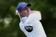 Rory McIlroy, of Northern Ireland, watches his tee shot on the second hole during a practice round for the PGA Championship golf tournament at the Quail Hollow Club, May 13, 2025, in Charlotte, N.C.
