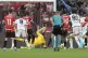 Bologna's Dan Ndoye (right covered) scores past AC Milan's goalkeeper Mike Maignan the opening goal during the Italian Cup final soccer match between AC Milan and Bologna at Rome's Olympic Stadium, May 14, 2025