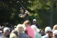 Rory McIlroy, of Northern Ireland, watches his tee shot on the 15th hole during the first round of the PGA Championship golf tournament at the Quail Hollow Club, Thursday, May 15, 2025, in Charlotte, N.C.