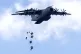 U.S. Army aircraft Lockheed Martin C-130J-30 Super Hercules drops military equipment during a 'Swift Response 2025' military exercises at the Gaiziunai Training Area, some 130 kms (80 miles) west of the capital Vilnius, Lithuania, May 16, 2025