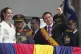 Ecuador's President Daniel Noboa and his wife, Lavinia Valbonesi, acknowledge supporters from the balcony of the presidential palace after his swearing-in ceremony for a second term in Quito, Ecuador, May 24, 2025
