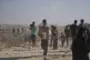Palestinians carry boxes containing food and humanitarian aid packages delivered by the Gaza Humanitarian Foundation, a U.S.-backed organization approved by Israel, in Rafah, southern Gaza Strip, May 27, 2025
