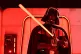 A Darth Vader costumed character poses at the Hasbro and Amazon Star Wars interactive Imperial March experience at the Empire State Building on March 21, 2024, in New York