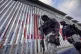 Members of the Mexican National Guard patrol next to the U.S.-Mexico border wall, January 25, 2025, in Tijuana, Mexico