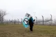 An anti-nuclear protester takes part in a demonstration, organised by Campaign for Nuclear Disarmament (CND), at the headquarters of the Atomic Weapons Establishment in Aldermaston, Berkshire, April 2013