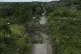 Anti-government demonstrators cut down trees to block a road while protesting a law that overhauls the social security agency, in Piriati, Panama, May 20, 2025