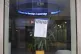 A poster stuck on the front window of a Barclays Bank in Cambridge, May 7, 2025