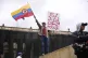 A demonstrator holds a sign reading in Spanish ‘Yes to the referendum’ during a strike called by pro-government labor unions in support of reforms proposed by President Gustavo Petro in Bogota, Colombia, May 28, 2025