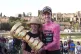 Simon Yates holds the trophy after he won the Giro d'Italia cycling race, in Rome, June 1, 2025