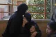 Sherin Wafi, center, and her daughter Mira, 4, mourn during the funeral of her husband Hosam Wafi who, according to family members, was killed during an Israeli strike, in Khan Younis, southern Gaza Strip, Monday, June 2, 2025