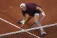 Jack Draper plays a shot against Alexander Bublik during their fourth round match of the French Tennis Open at the Roland-Garros stadium in Paris, June 2, 2025