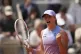 Poland's Iga Swiatek celebrates as she won the quarterfinal match of the French Tennis Open against Ukraine's Elina Svitolina at the Roland-Garros stadium in Paris, June 3, 2025