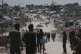 Displaced Palestinians return to retrieve their belongings from their homes in the area where the Israeli army operated in the northern Gaza Strip on June 4, 2025