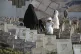 Yemenis visit the graves of their relatives on the first day of Eid al-Adha, in Sanaa, Yemen, June 6, 2025