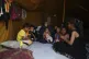 Maryam Abu Shaar, 29, sits with her children inside their tent at a camp for displaced Palestinians in Mawasi Khan Younis, Gaza Strip, on the first day of Eid al-Adha, Friday, June 6, 2025. (