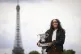 Coco Gauff, of the U.S, holds her trophy in front of the Eiffel Tower after her Saturday victory in the French Tennis Open, June 8, 2025 at the Place de la Concorde in Paris