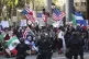 Law enforcement officers stand guard as demonstrators protest, June 11, 2025, in Los Angeles