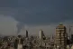 Huge smoke rises up from an oil facility facility after it appeared to have been hit by an Israeli strike Saturday, in southern Tehran, Iran, June 15, 2025