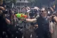 A protester holds a water gun during a protest against overtourism in Barcelona, Spain, June 15, 2025