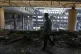 A man walks in the damaged headquarters of Islamic Republic of Iran Broadcasting, Iranian state television, in Tehran, Iran, June 19, 2025.