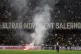 A firefighter tends to a flare thrown onto the pitch during a playoff between Sampdoria and Salernitana to stay in Serie B, which caused the suspension of the match, at the at the Arechi Stadium in Salerno, southern Italy, July 22, 2025