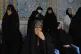 People attend the funeral ceremony of Mahan Setareh, a member of the paramilitary Basij force who was killed in Israeli attacks, in Tehran, Iran, June 26, 2025