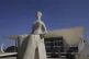 Lady Justice statue, depicting a seated, blindfolded woman holding a sword, stands outside the Supreme Court in Brasilia, Brazil, September 2, 2024