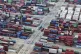 Trucks loaded with container move through a container terminal port in Shanghai, China, June 9, 2025