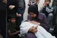 Palestinian woman holds the body of her daughter Mayar Abu Odeh, 8, who was killed in an Israeli military strike on Gaza, at Al-Shifa Hospital in Gaza City, June 4, 2025