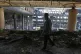 A man walks in the damaged headquarters of Islamic Republic of Iran Broadcasting, Iranian state television, in Tehran, Iran, June 19, 2025